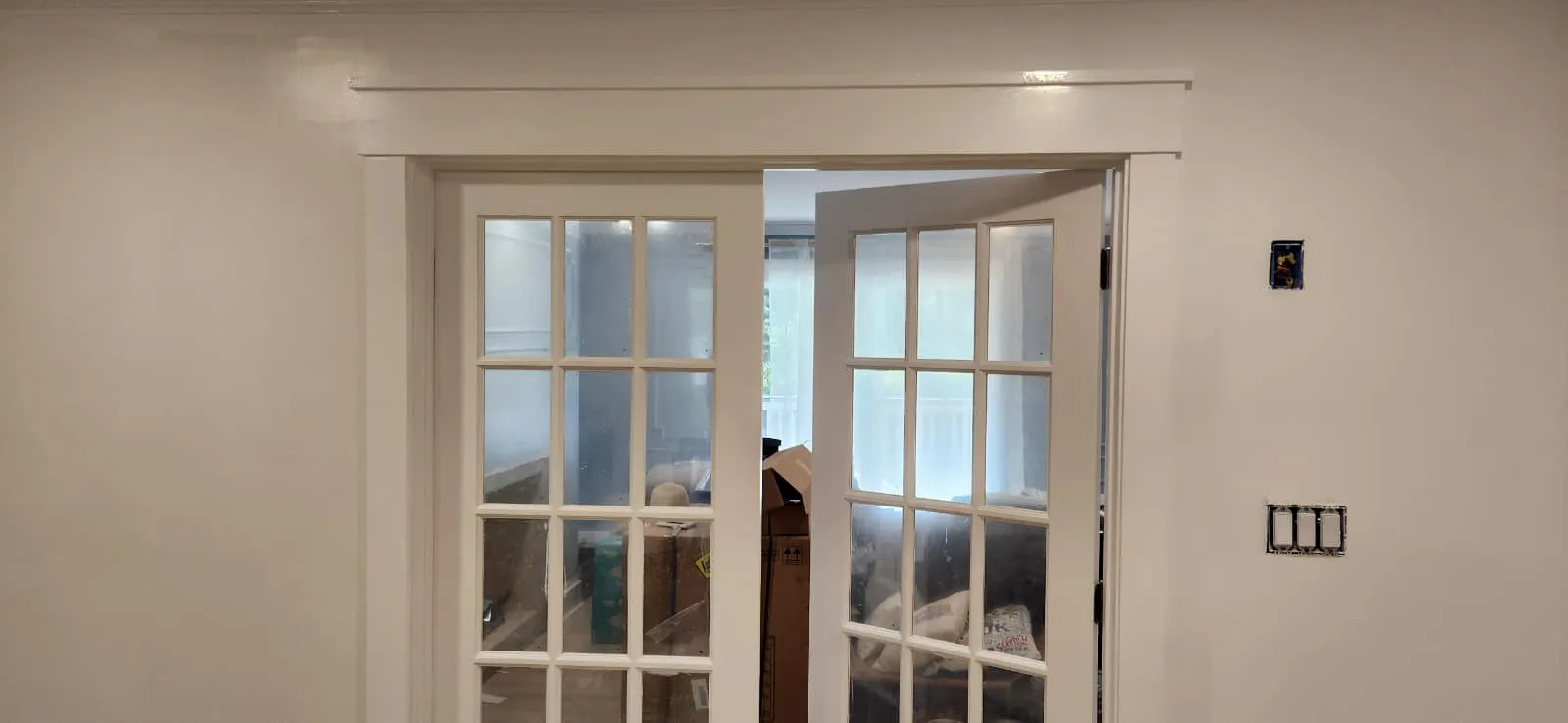 New French doors and trim added to make an office