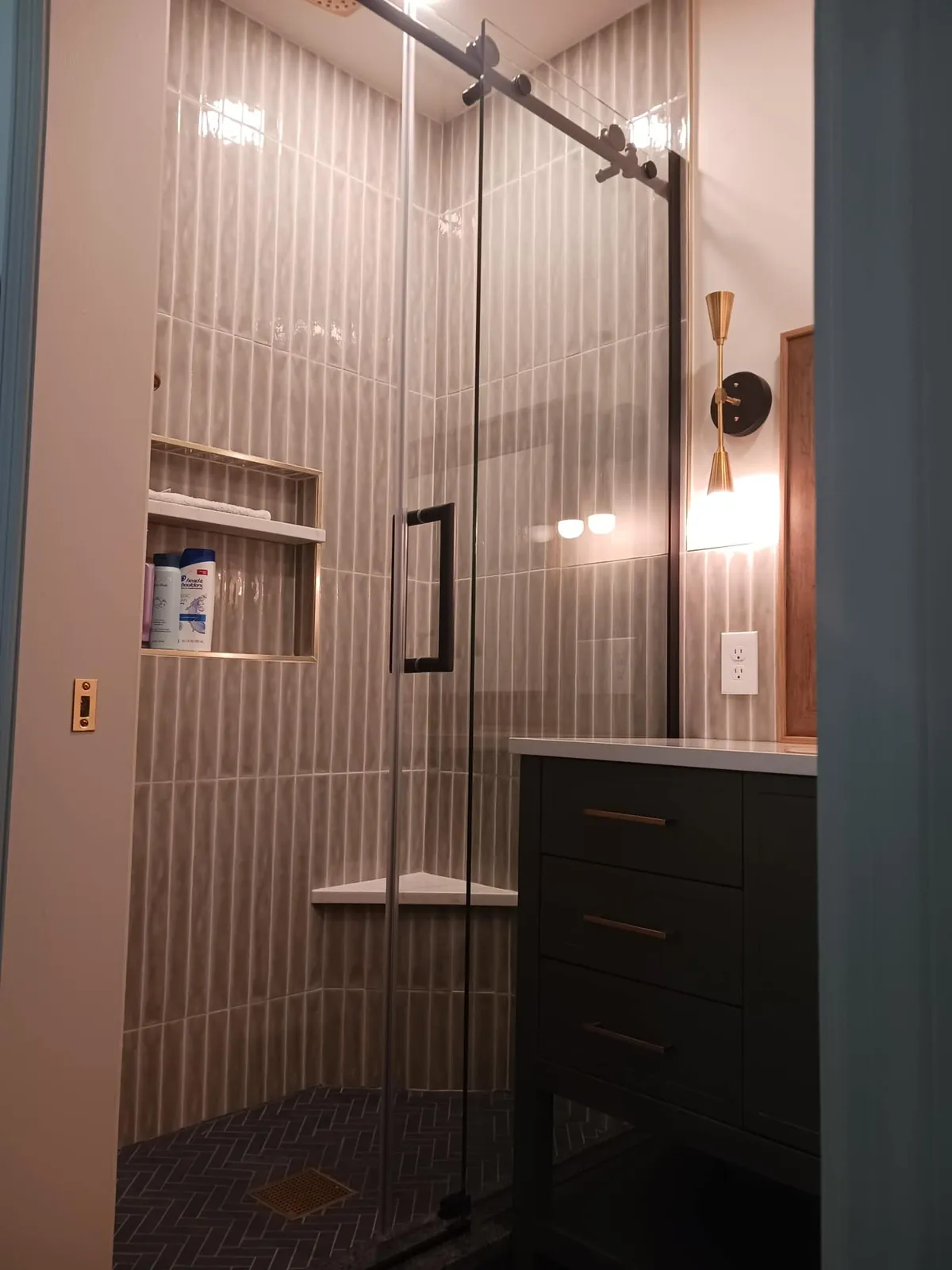 Vertical tile and a glass shower, midtown