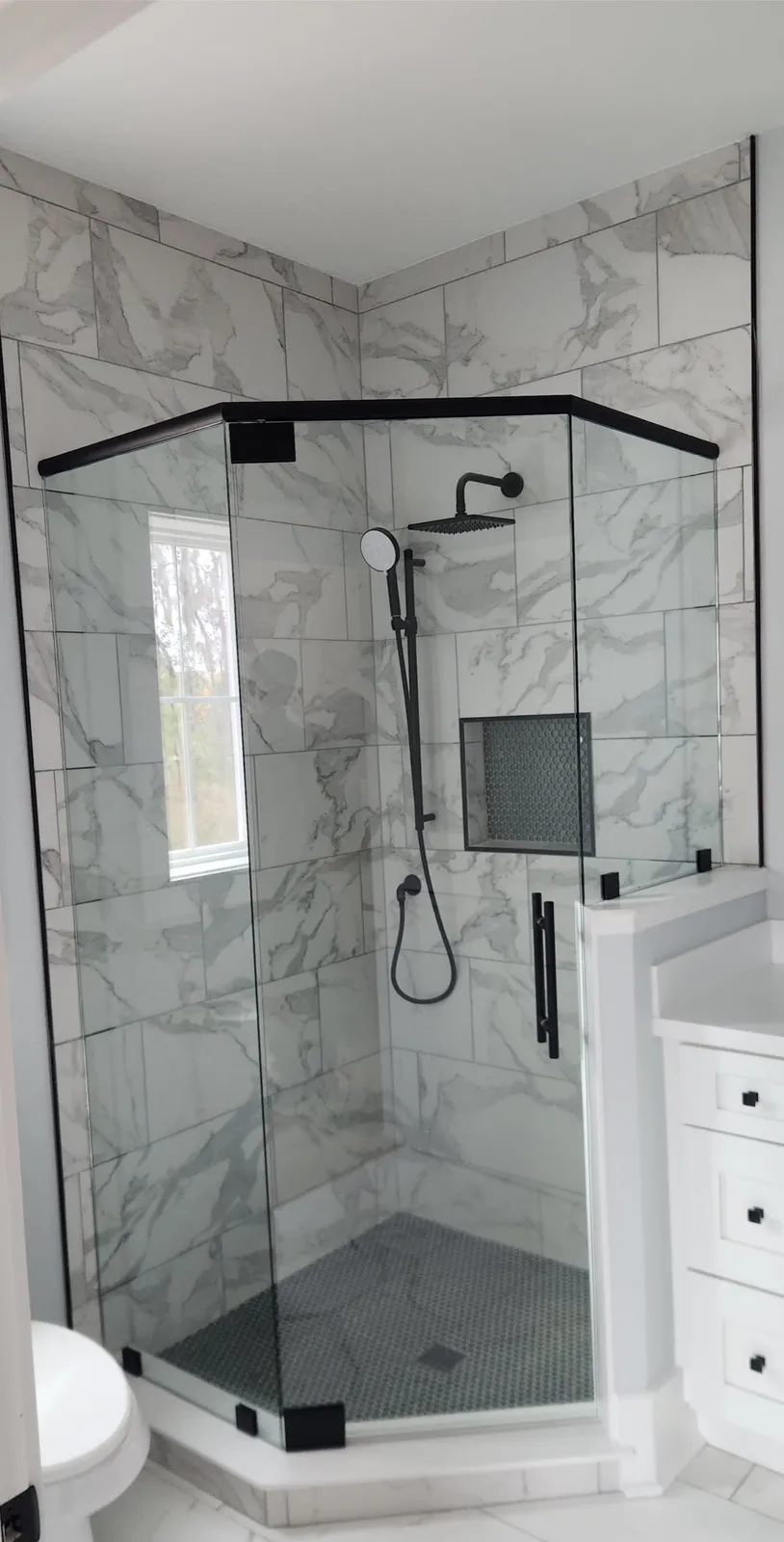 A second shower in the same new home, in black