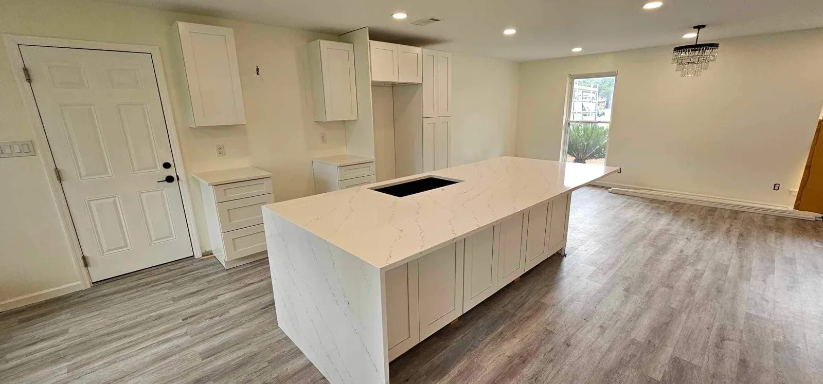 Quartz countertops with a waterfall ledge