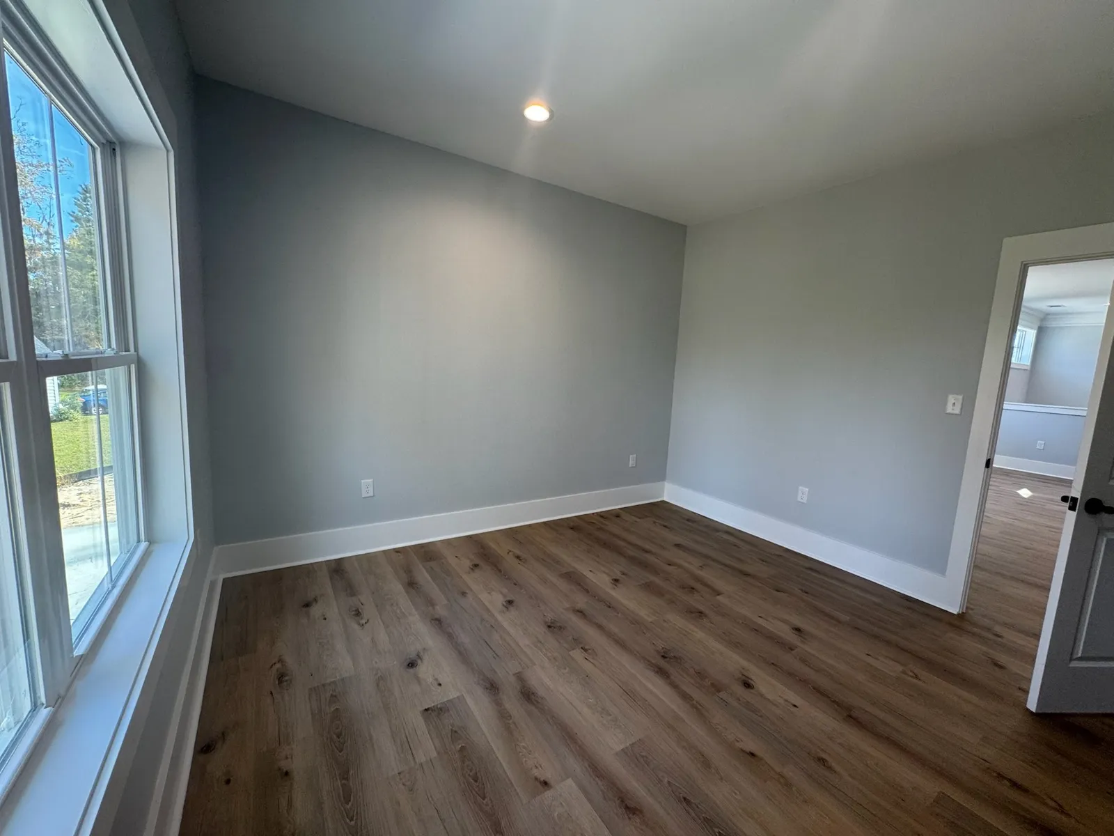A bedroom in a 4,700 sq ft custom home at completion
